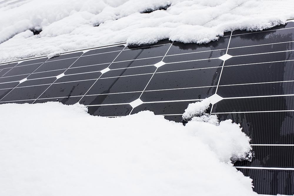 how to keep snow off solar panels